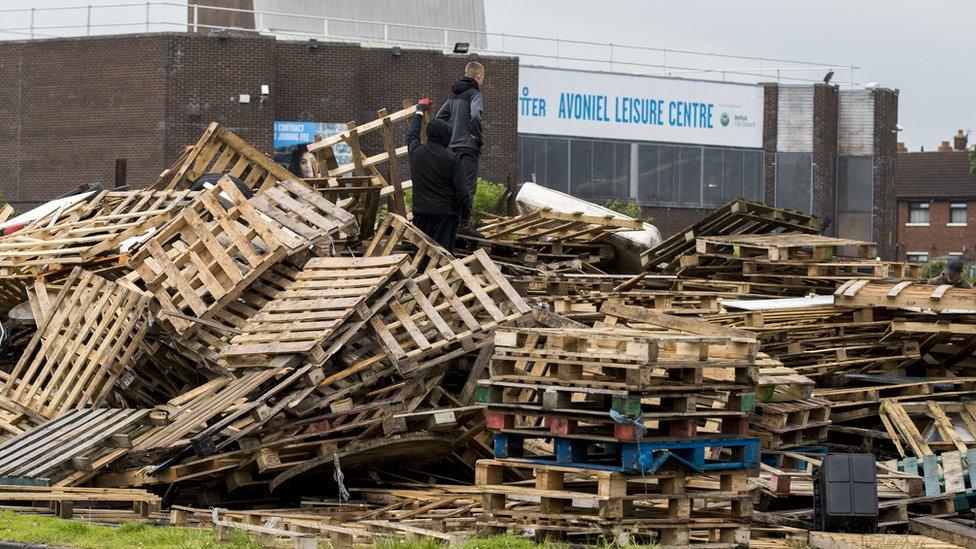 Young people stand on the bonfire at Avoniel Leisure Centre