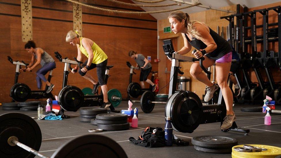 People on bikes at the gym