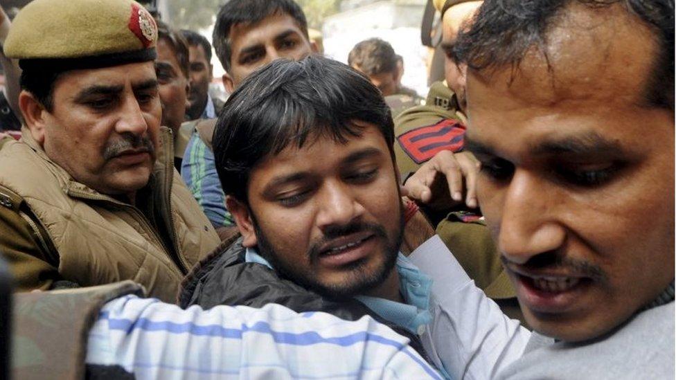 Kanhaiya Kumar (C), head of the student union at Delhi"s Jawaharlal Nehru University (JNU), is escorted by police outside the Patiala House court in New Delhi, India. February 17, 2016.