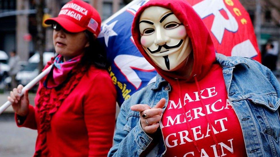 Supporters of former US president Donald Trump protest outside the Manhattan District Attorney's office in New York City on April 3, 2023