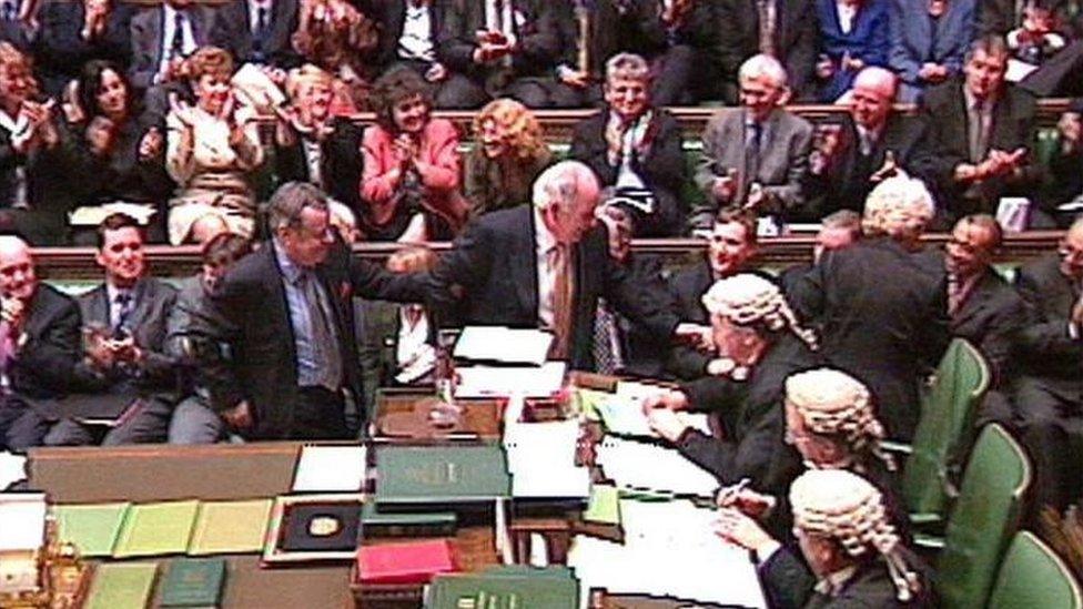 Michael Martin is dragged to the Speaker's chair by colleagues after being voted in as new House of Commons Speaker in 2000