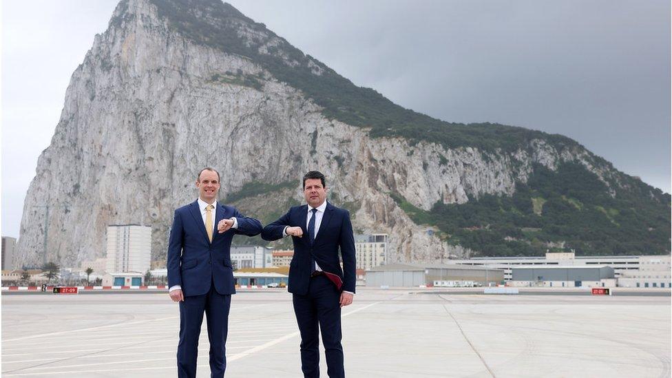 Foreign Secretary Dominic Raab is greeted by Chief Minister Fabian Picardo as he arrives at RAF Gibraltar