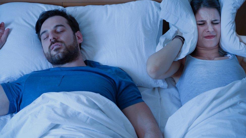 Woman unable to sleep due to man snoring