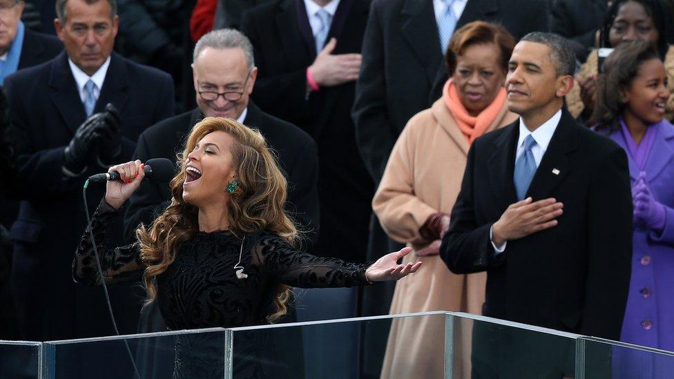 Beyonce performs the national anthem as U.S. President Barack Obama looks on during the presidential inauguration on the West Front of the U.S. Capitol January 21, 2013 in Washington, DC.