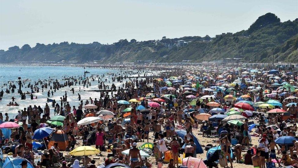 people-on-bournemouth-beach.