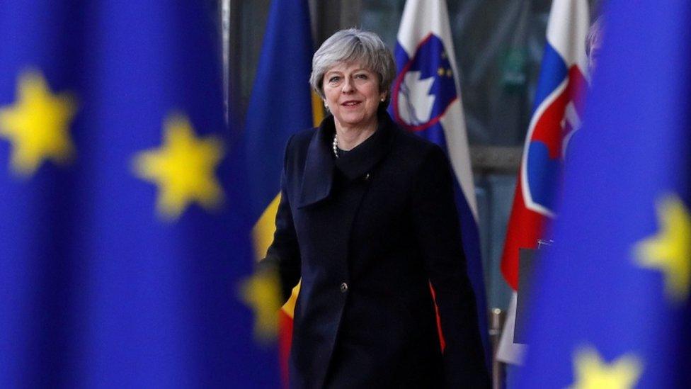 Theresa May arrives at the EU summit in Brussels in December 2017