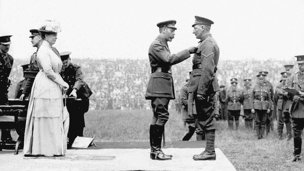 Spencer John Bent receives his VC from King George V