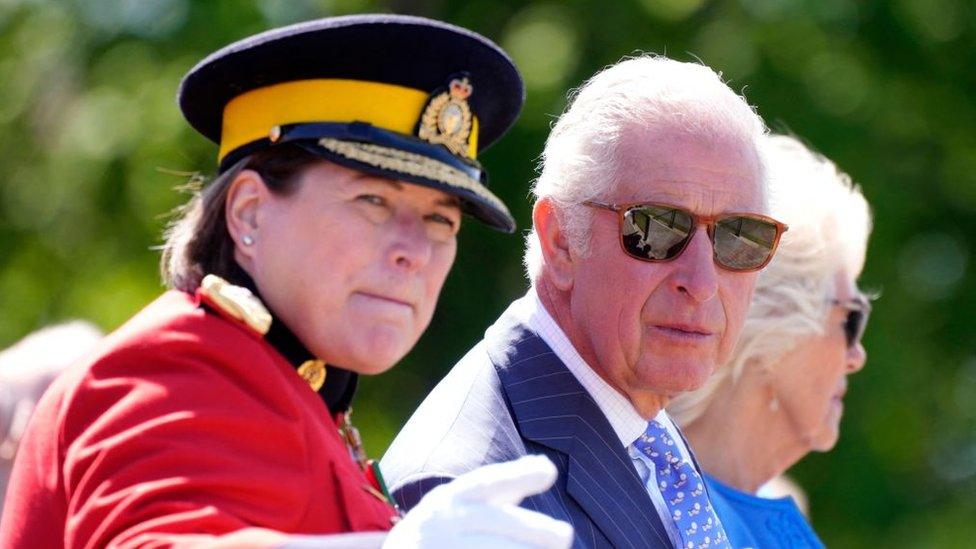 Britain's Prince Charles and Camilla, Duchess of Cornwall talk with RCMP Commissioner Brenda Lucki as they watch the Royal Canadian Mounted Police (RCMP) in Ottawa, Ontario, on their Canadian Royal Tour, May 18, 2022