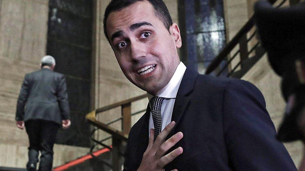 Luigi Di Maio speaks to journalists at the end of a meeting at his ministry in Rome, 21 January 2019