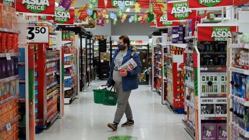 Shopper in Asda at Christmas