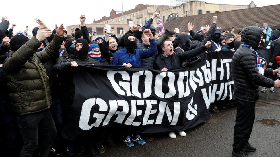 Rangers fans with banner