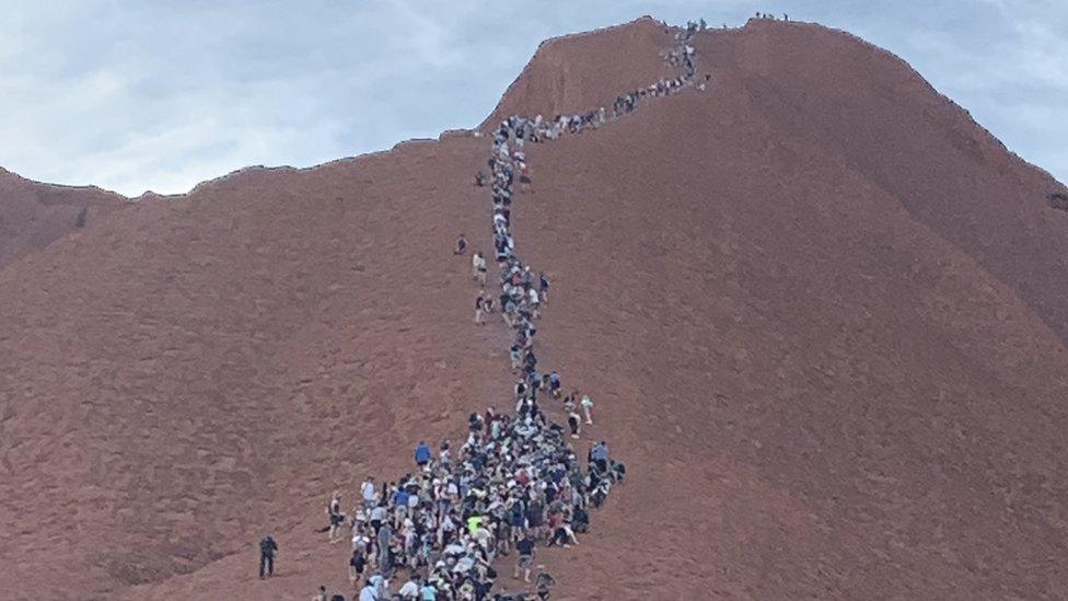 A line of climbers on the rock on 2 October 2019