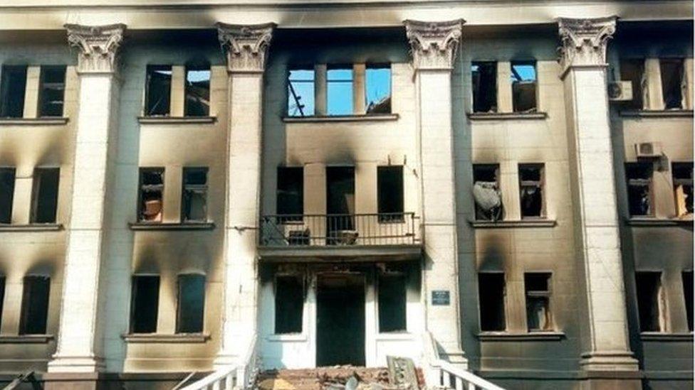 Russia-Ukraine conflict / Russian invasion: Rubble and debris outside the ruins / remains of the Mariupol Theatre in the aftermath of a bombing attack, Ukraine, released 18 Mar 2022