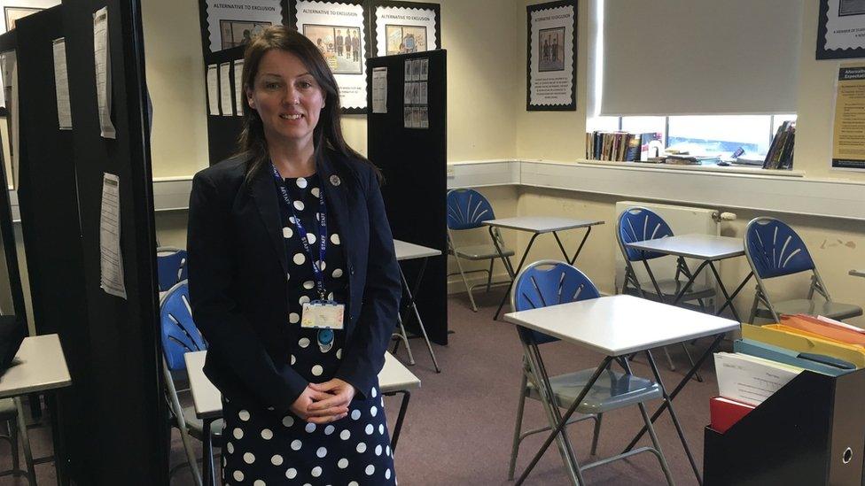 Nicola Koncarevic stands in school