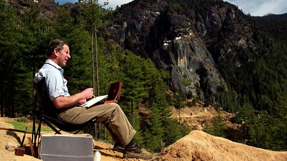 The Prince of Wales sketching the Tiger's Nest monastery in Bhutan in 1998