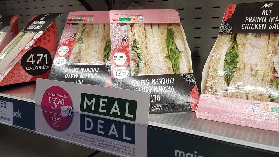 sandwiches and meal deal sign