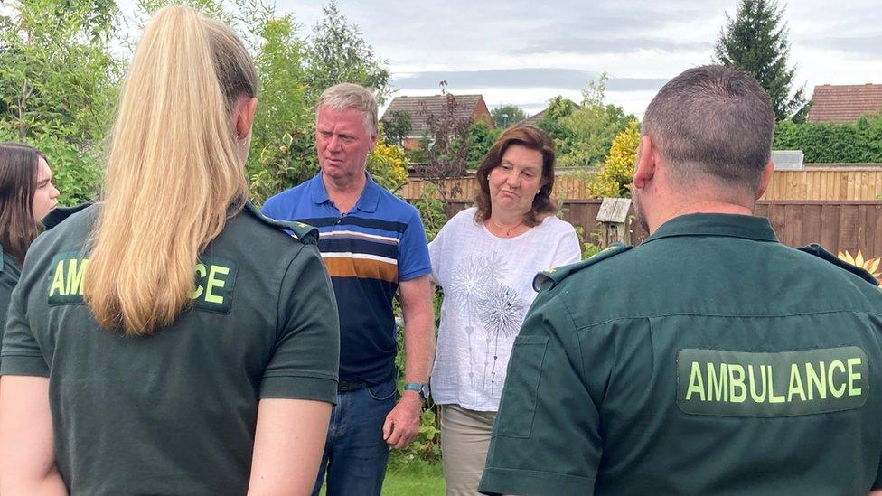 Ambulance staff pictured with Sue and Robert Fensom