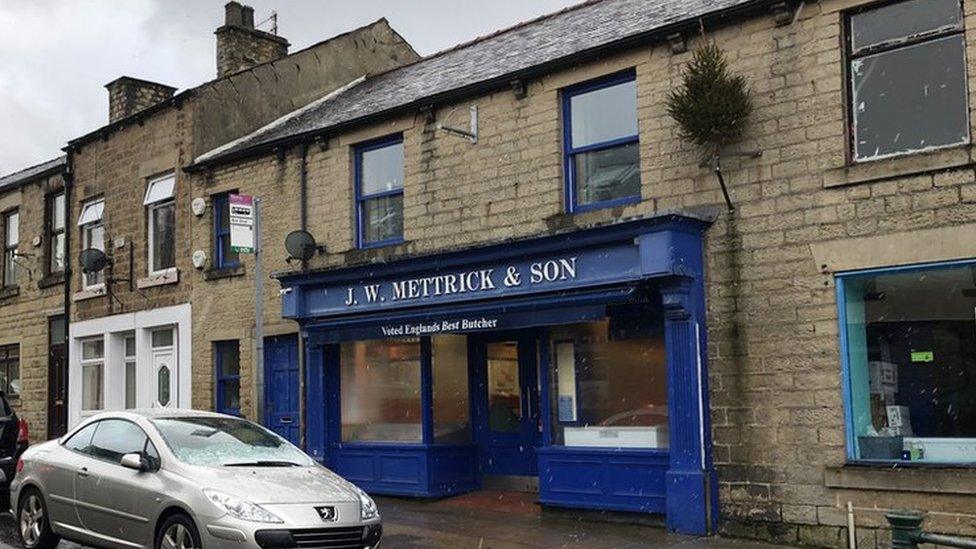 Outside shot of J W Mettrick & Son butchers' shop