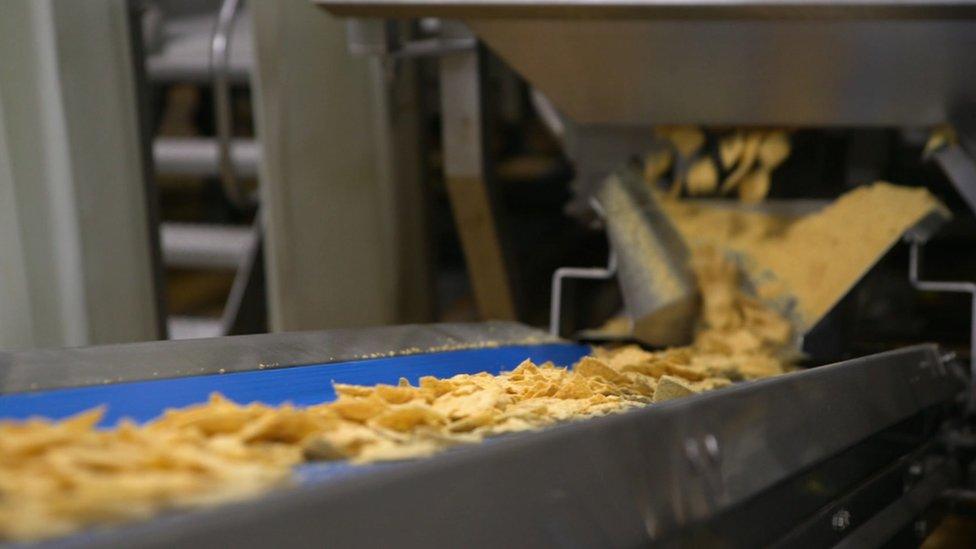 Doritos on a conveyor belt