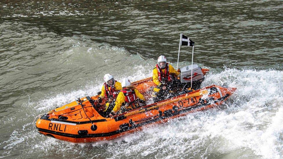 Looe RNLI Lifeboat Station in boat in ocean