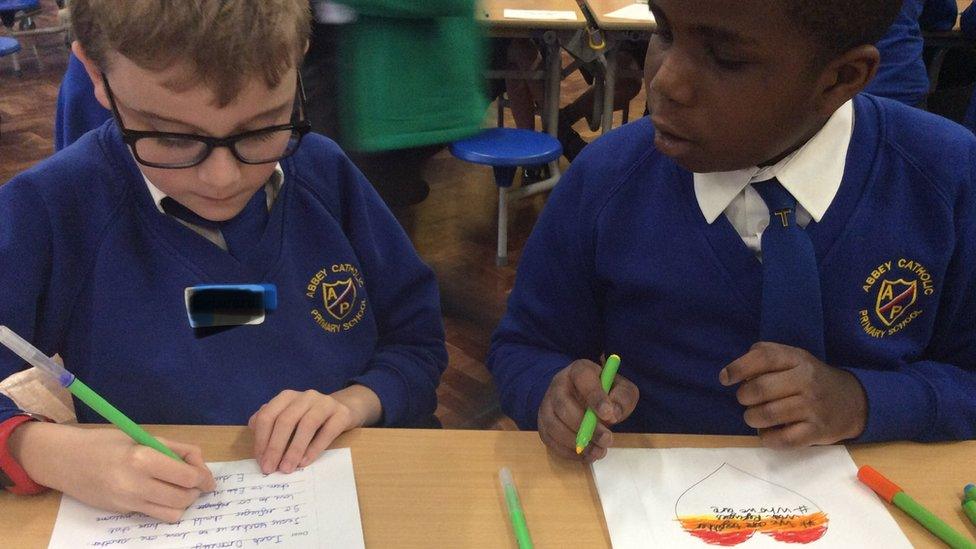 School children preparing artwork