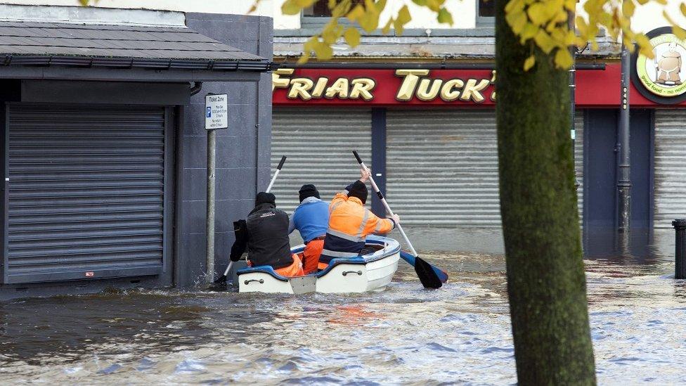 A boat was paddled up a flooded road in front of the Arts Centre in Newry on Tuesday morning