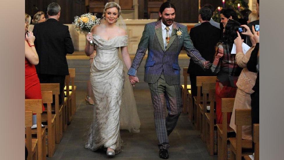 Jean and Lee Price walking down the aisle on their wedding day