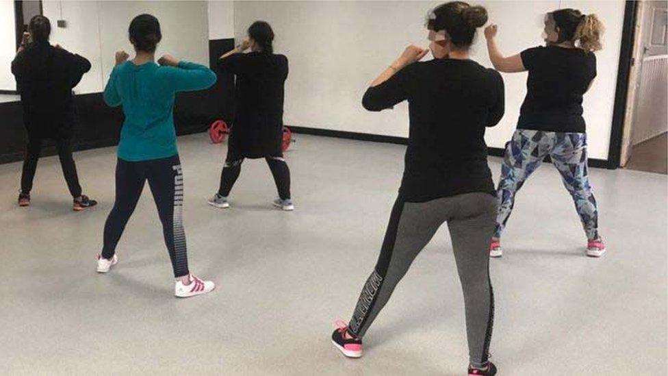 Women taking self-defence classes