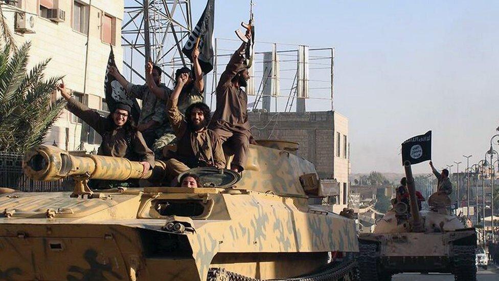 IS fighters in Raqqa in 2014