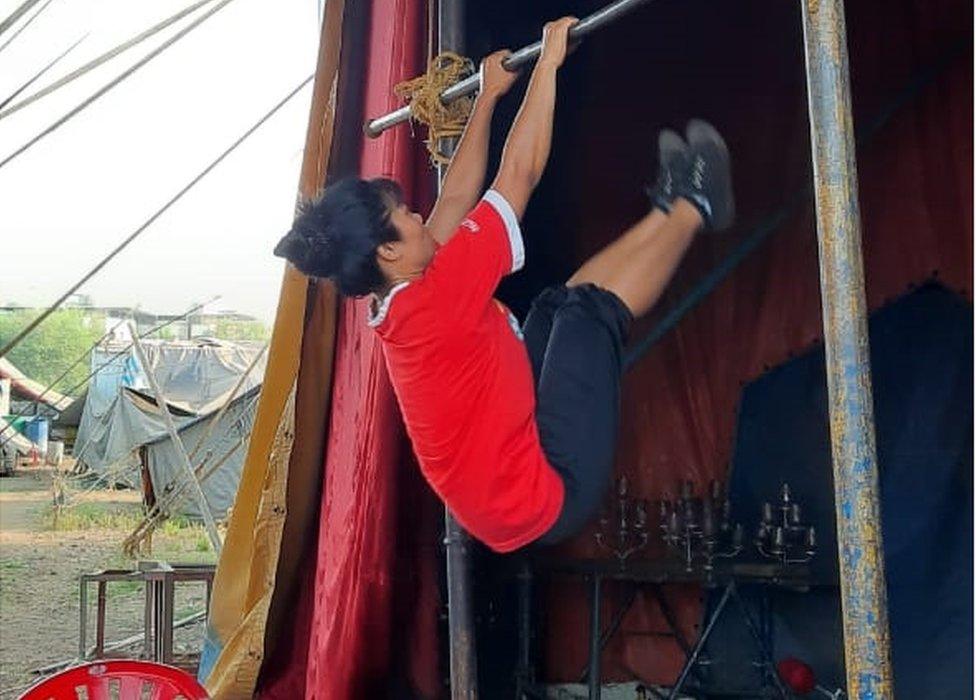 A trapeze artist at the circus