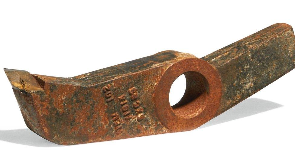 An iron and steel 'tooth' blade from the borer machine that broke through the final section of the Channel Tunnel