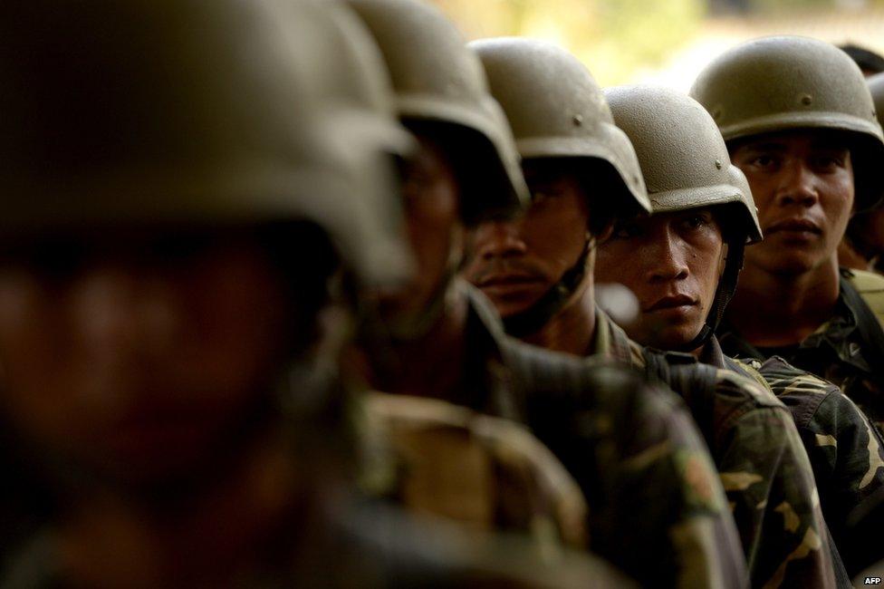 This photo taken on 31 March 2015 shows Philippine soldiers standing in formation at the provincial capital building turned into a military camp in Shariff Aguak, Maguindanao Province, Southern Philippines.