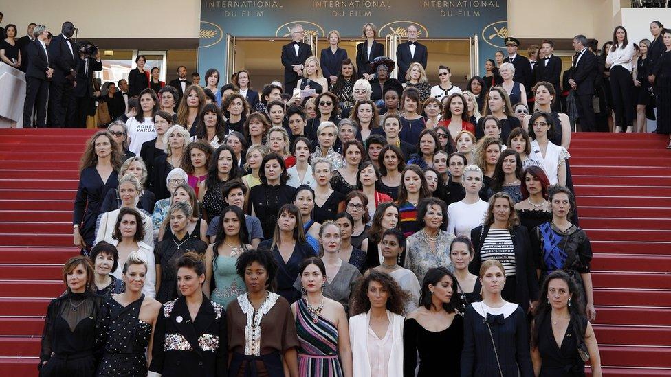 Actresses and female directors stand on the steps of the red carpet in protest of the lack of female filmmakers honoured throughout the history of the festival during the 71st annual Cannes Film Festival, in Cannes, France, 12 May 2018.