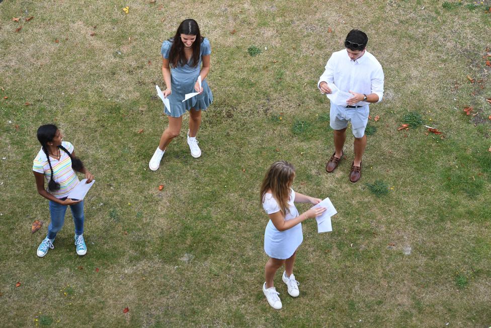 Students practise social distancing as they receive their A-Level results