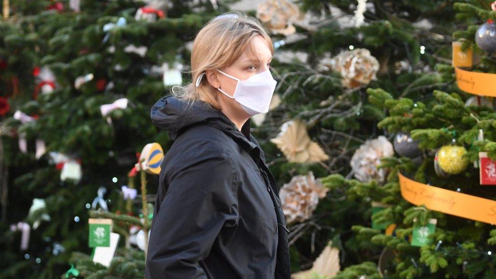 Woman in a mask in Covent Garden