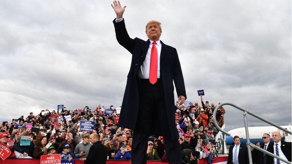 US President Donald Trump arrives for a "Make America Great Again" rally at Bozeman Yellowstone International Airport