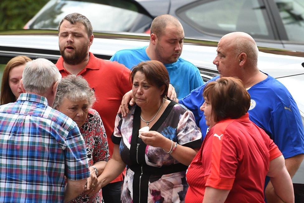 Sally Stokes (centre) arriving for the funeral of her sons Matthew and Adam at St Mary's Church, Hinckley, Leicestershire.