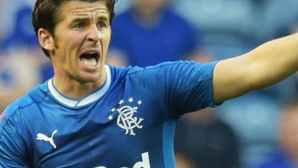 Joey Barton makes a point to a team-mate after making his Rangers debut as a substitute