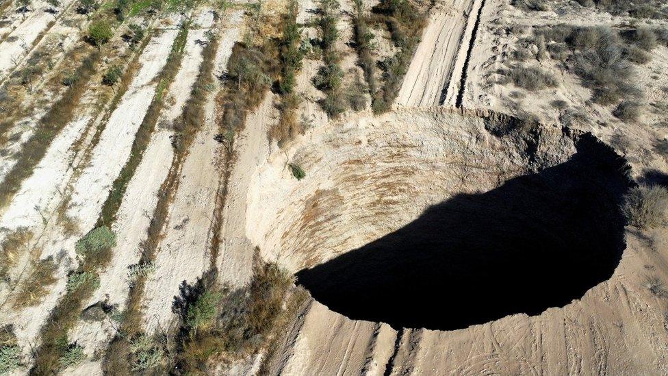 still shows the sinkhole in chile from the air