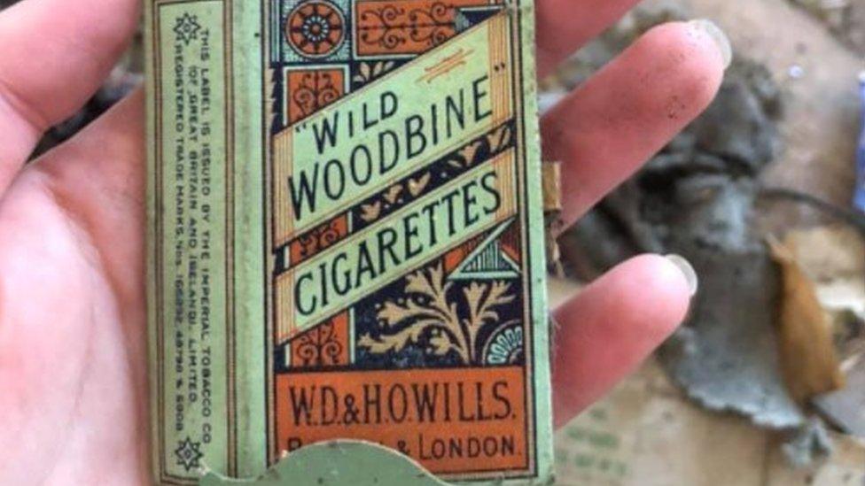 A cigarette packet was among the objects found