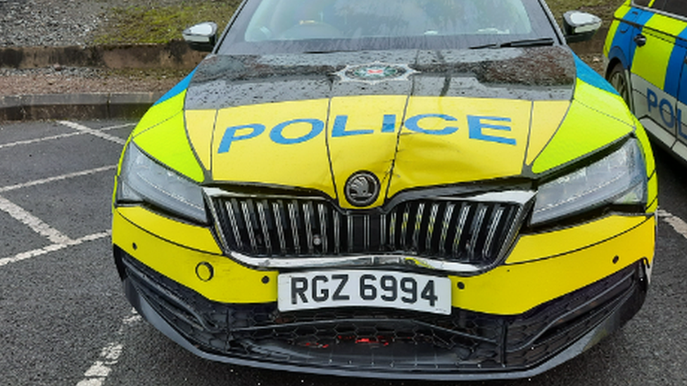 Damaged police vehicle