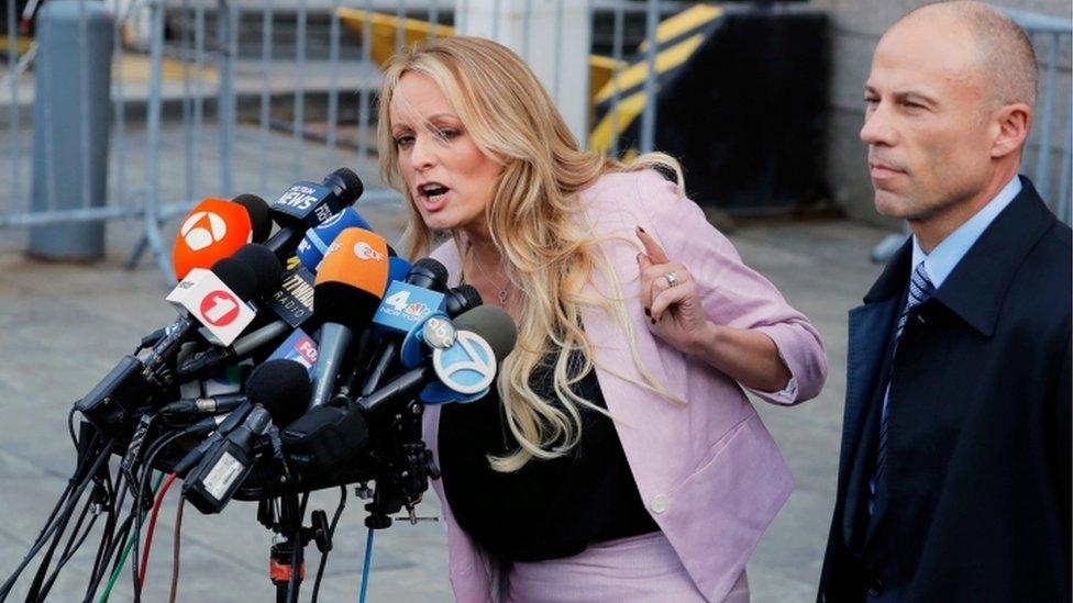 Stormy Daniels and Michael Cohen appear outside court