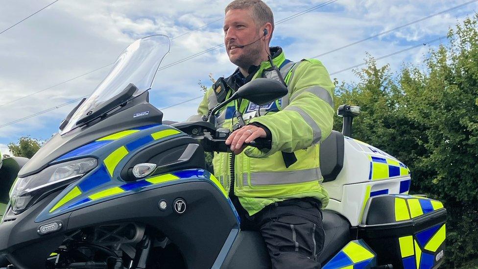 Police officer on one of the new three-wheeler bikes