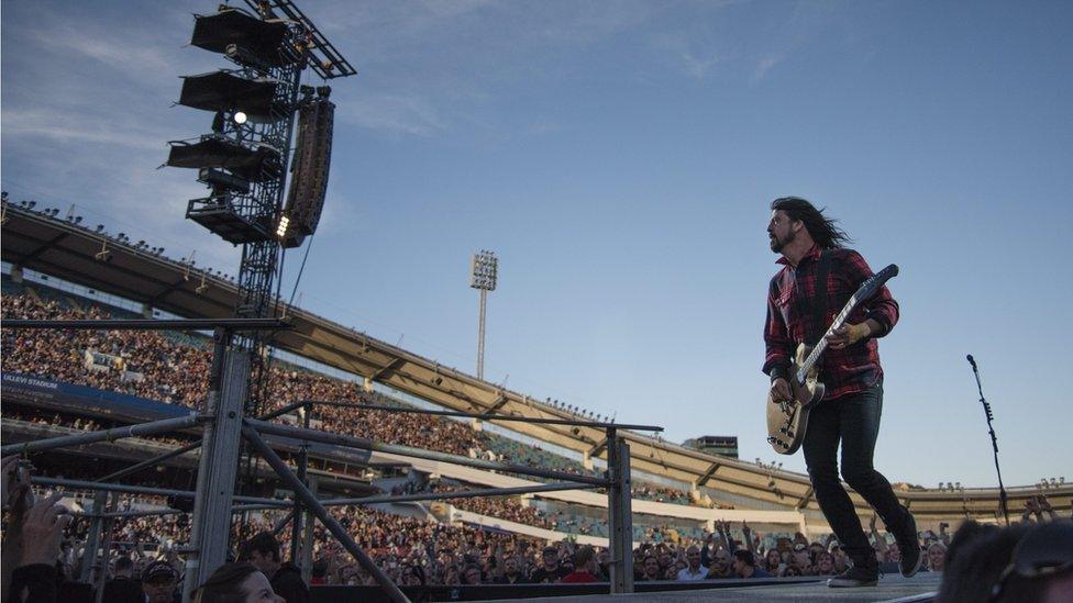 Dave Grohl performs in Gothenburg moments before falling from the stage