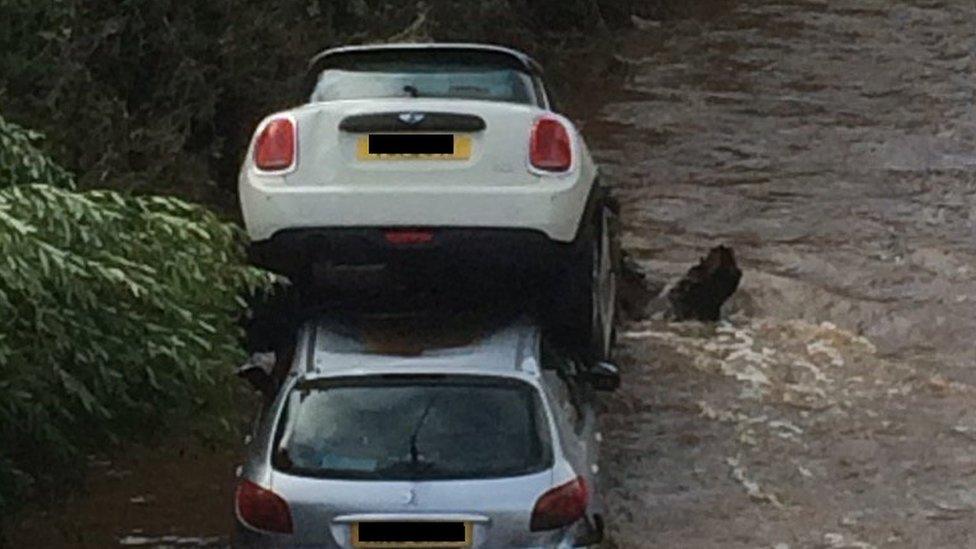 Cars stacked on top of each other in Drumahoe, County Londonderry