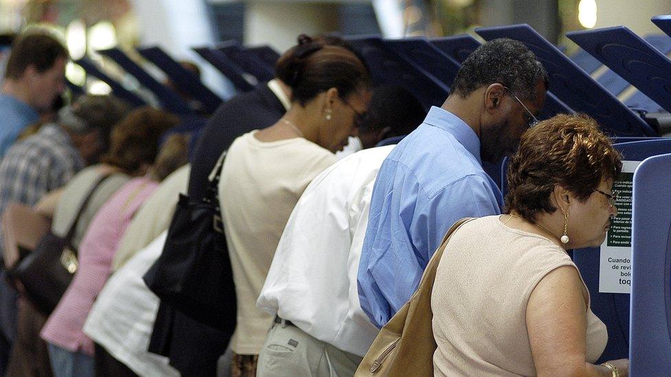 Americans vote at a polling station in Florida.