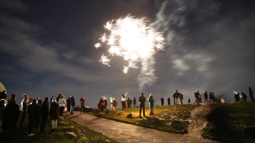 People watch fireworks