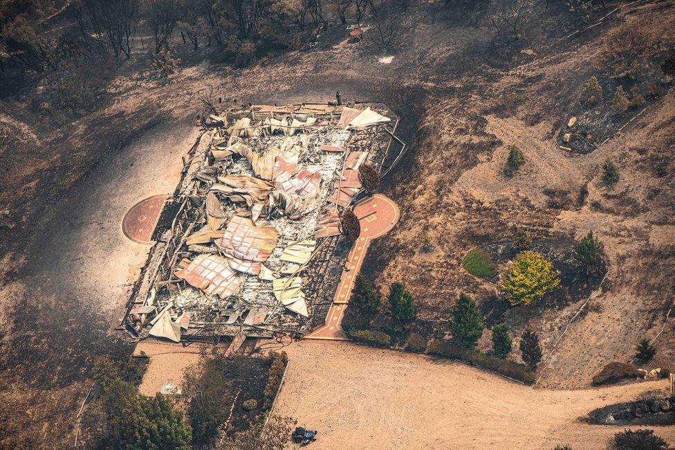 An aerial view of property damaged by bushfires