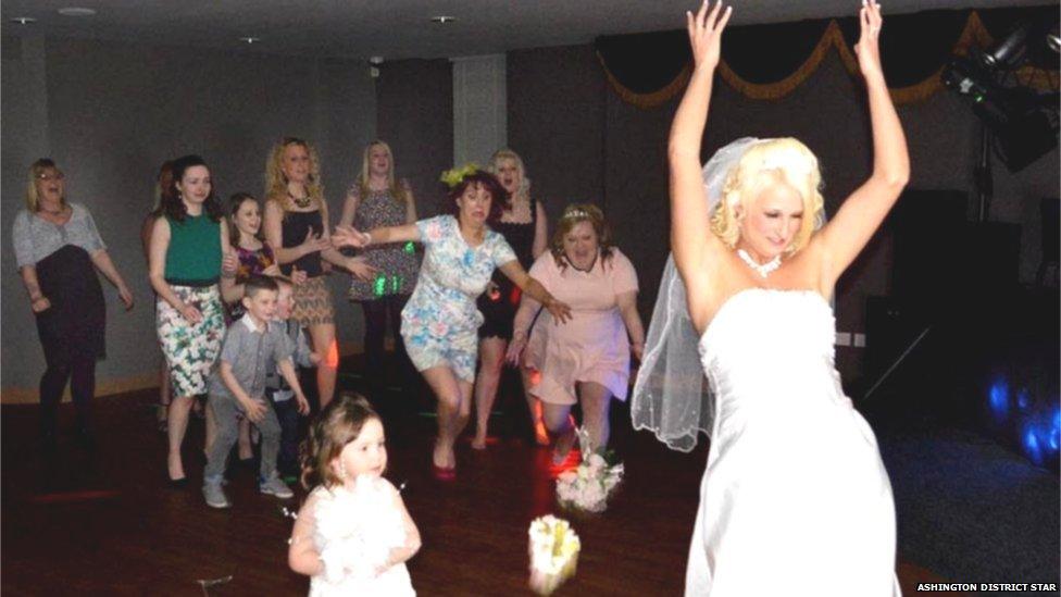 Bride, Lisa Rogers throwing her wedding bouquet at The Portland, Ashington