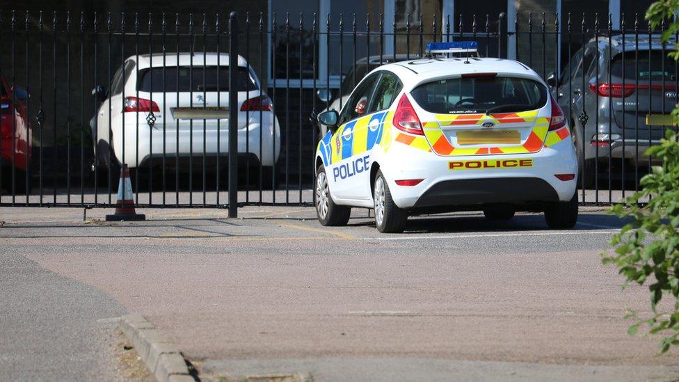 A police car at the school